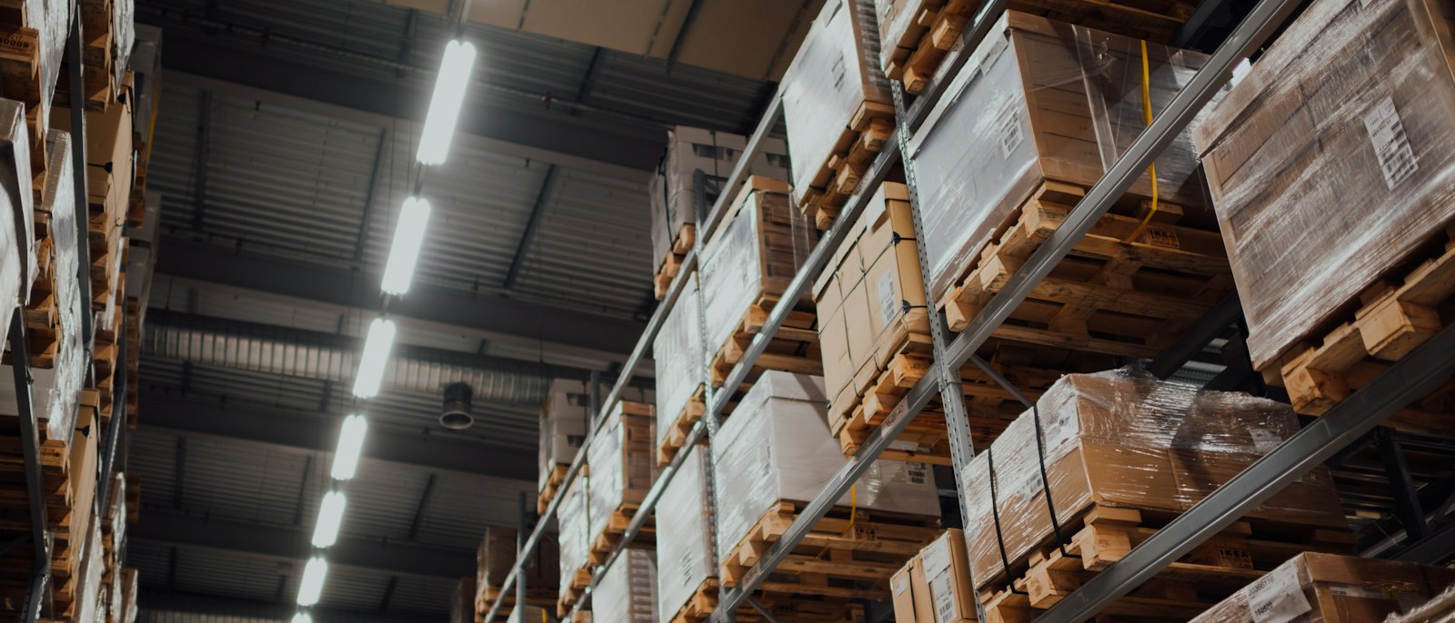 Palletised stock held on racking in an industrial supply warehouse